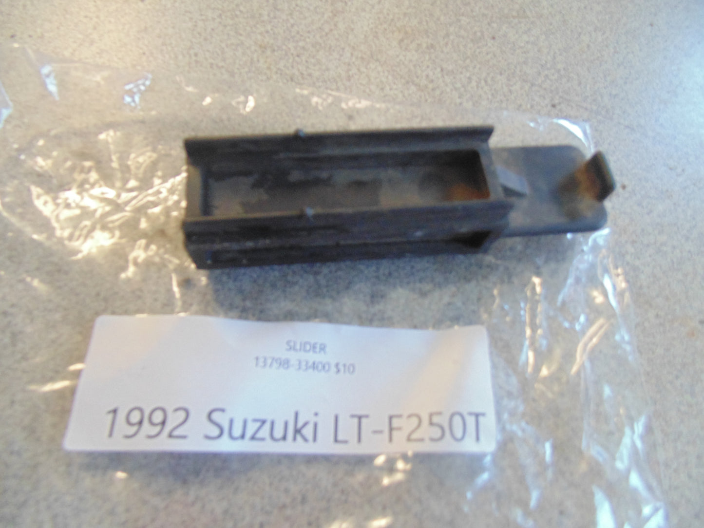 1992 SUZUKI LT-250T SLIDER 13798-33400