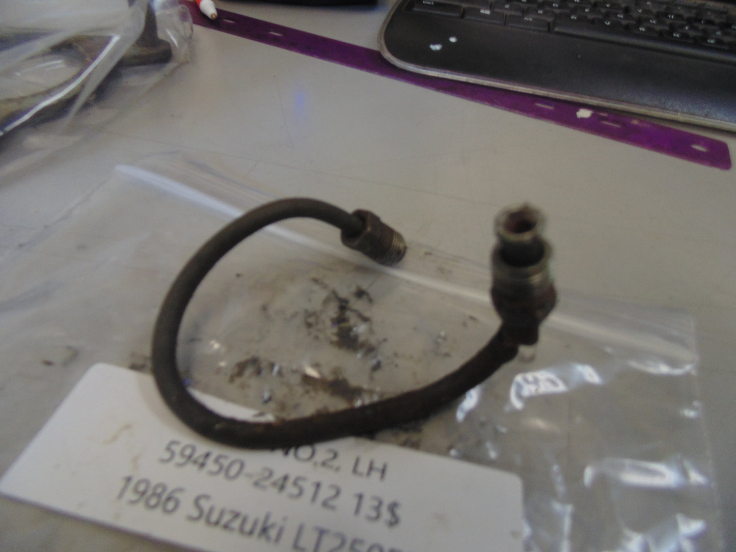 1986 SUZUKI LT250EF PIPE NO 2 LH 59450-24512