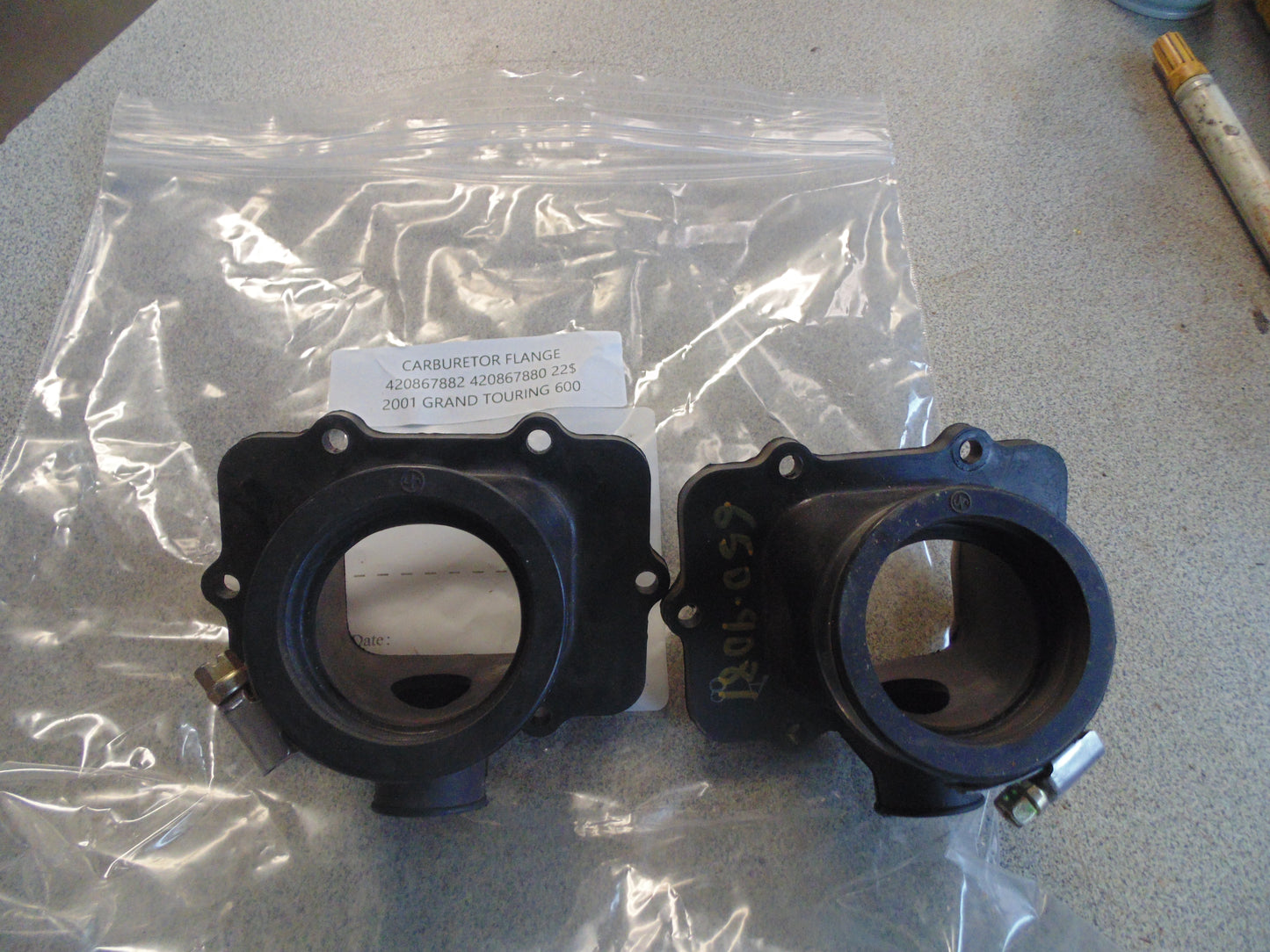 2001 GRAND TOURING 600 CARBURETOR FLANGE 420867882 420867880