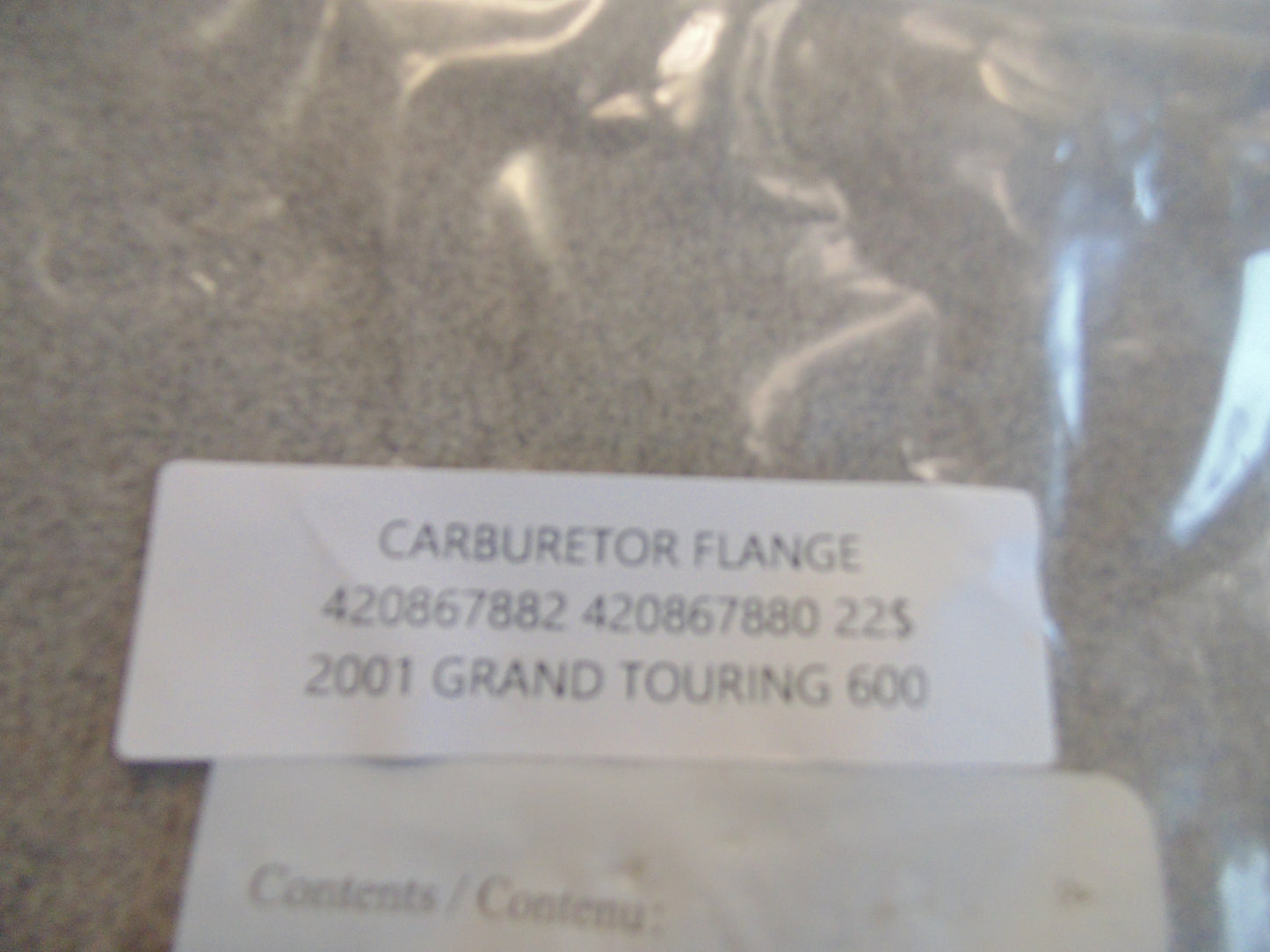 2001 GRAND TOURING 600 CARBURETOR FLANGE 420867882 420867880