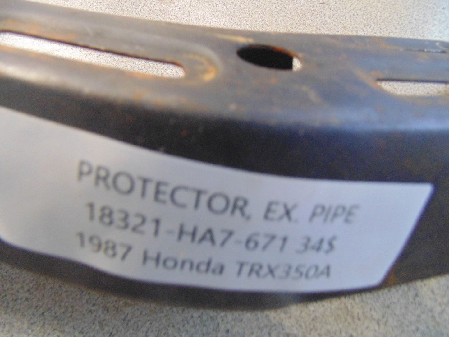 1987 HONDA TRX350A PROTECTOR EX PIPE 18321-HA7-671