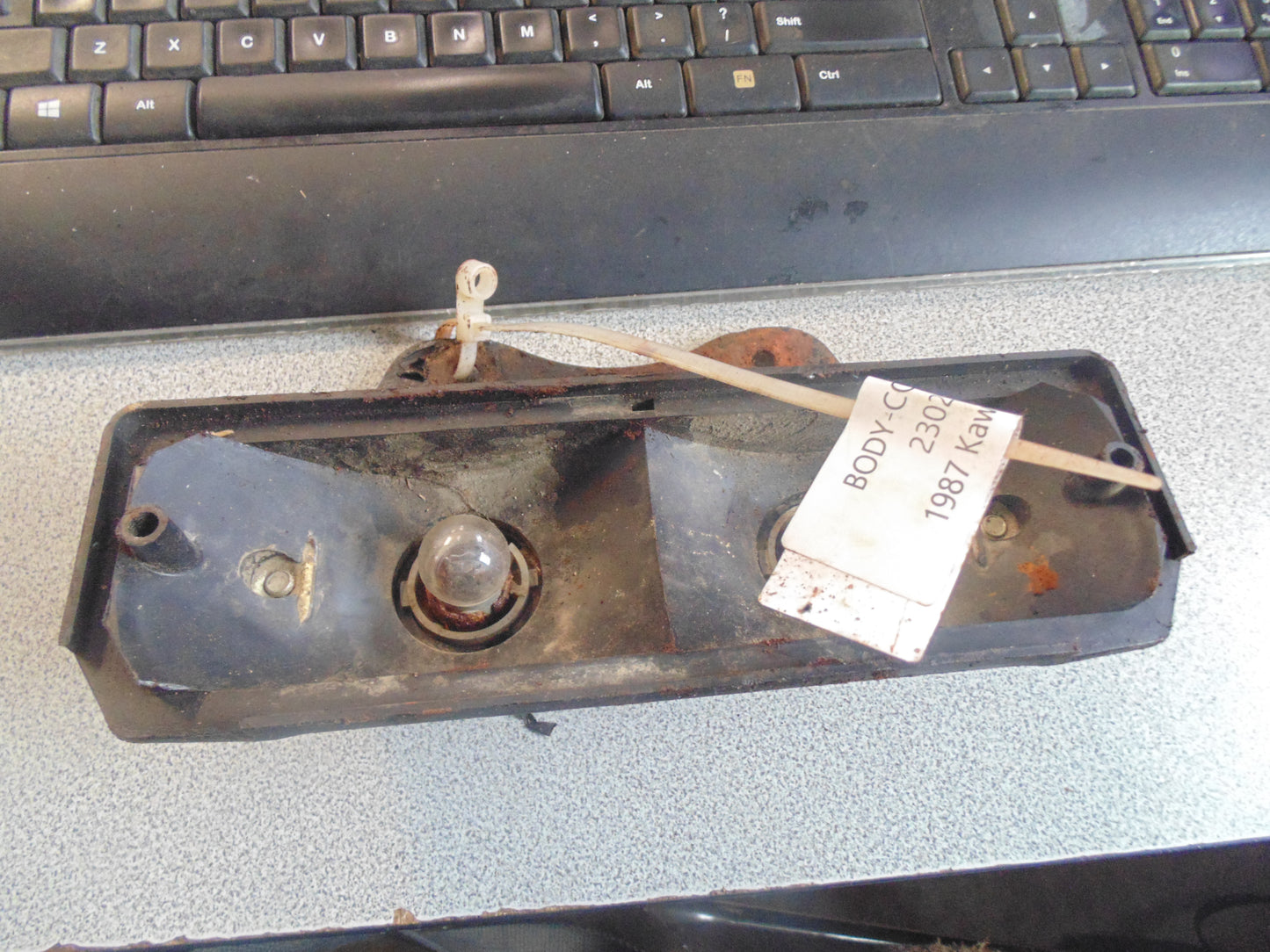 1987 KAWASAKI BAYOU 300 BODY COMP TAIL LAMP 23027-1064