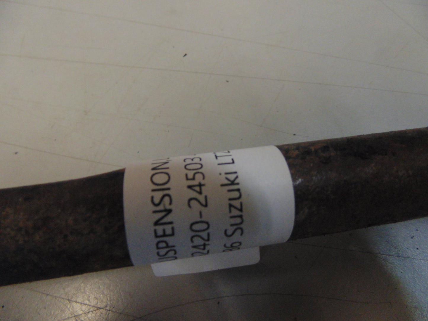 1986 SUZUKI LT250EF ARM SUSPENSION LOWER LH 52420-24503