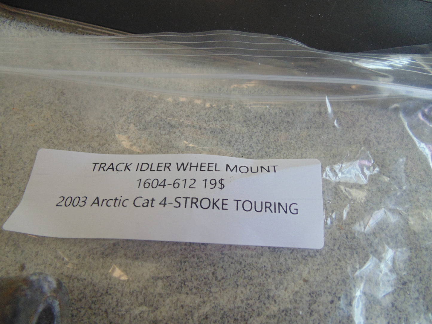 2003 ARCTIC CAT 4 STROKE TOURINGTRACK IDLER WHEEL MOUNT  1604-612