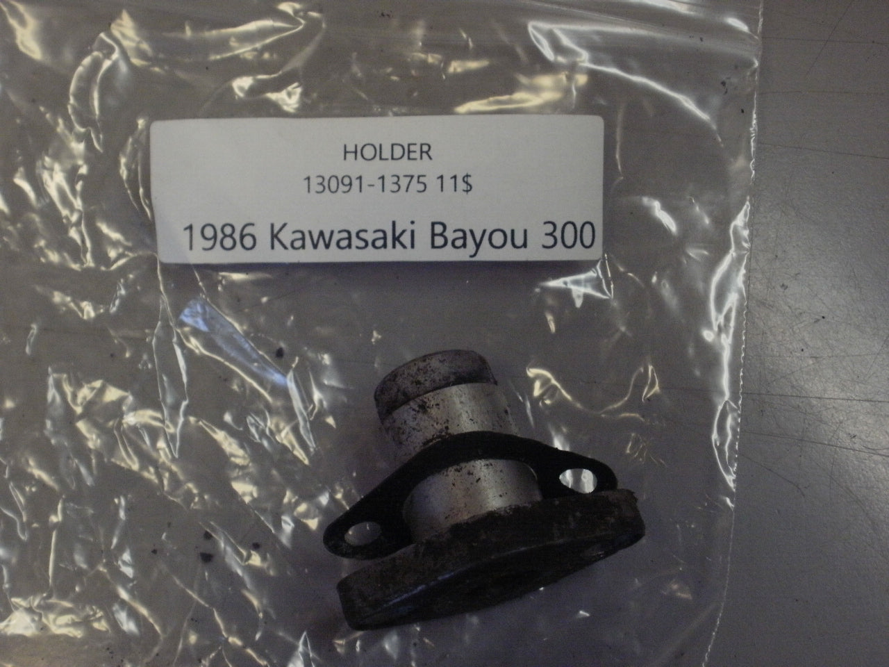 1986 KAWASAKI BAYOU 300 HOLDER 13091-1375