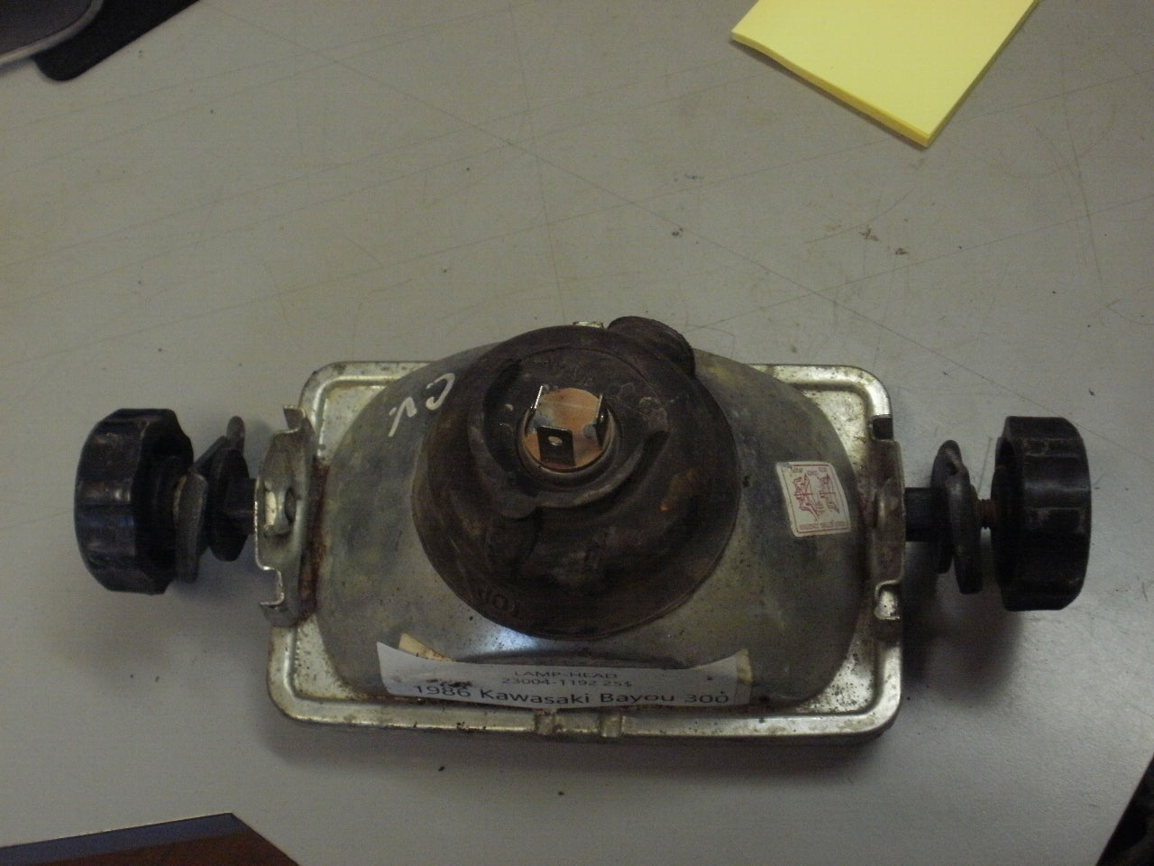 1986 KAWASAKI BAYOU 300 LAMP HEAD 23004-1192
