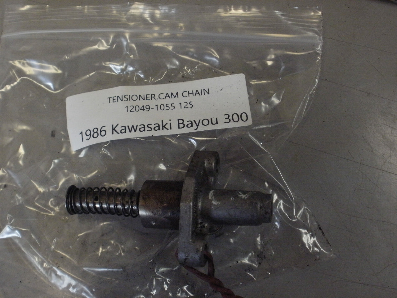 1986 KAWASAKI BAYOU 300 TENSIONER CAM CHAIN 12049-1055