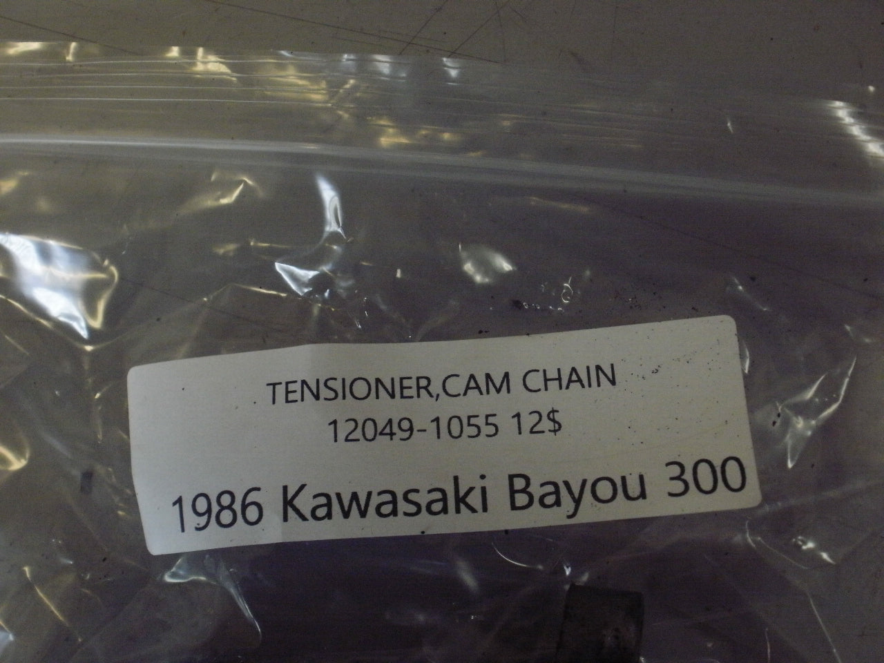 1986 KAWASAKI BAYOU 300 TENSIONER CAM CHAIN 12049-1055