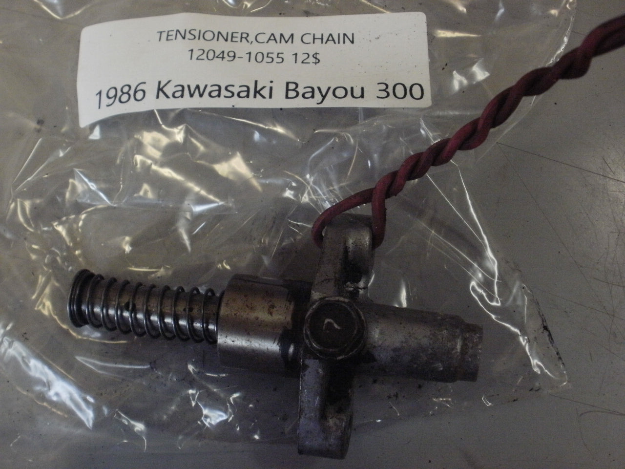 1986 KAWASAKI BAYOU 300 TENSIONER CAM CHAIN 12049-1055