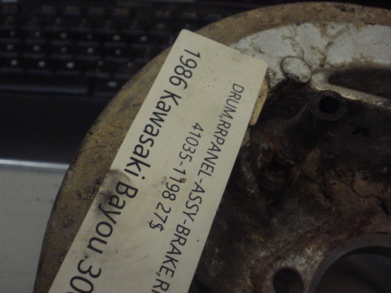 1986 KAWASAKI BAYOU 300 DRUM RR PANEL ASSY BRAKE RR L 41035-1198