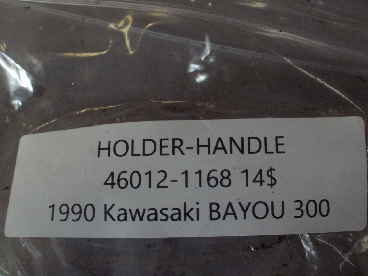 1990 KAWASAKI BAYOU 300 HOLDER HANDLE 46012-1168