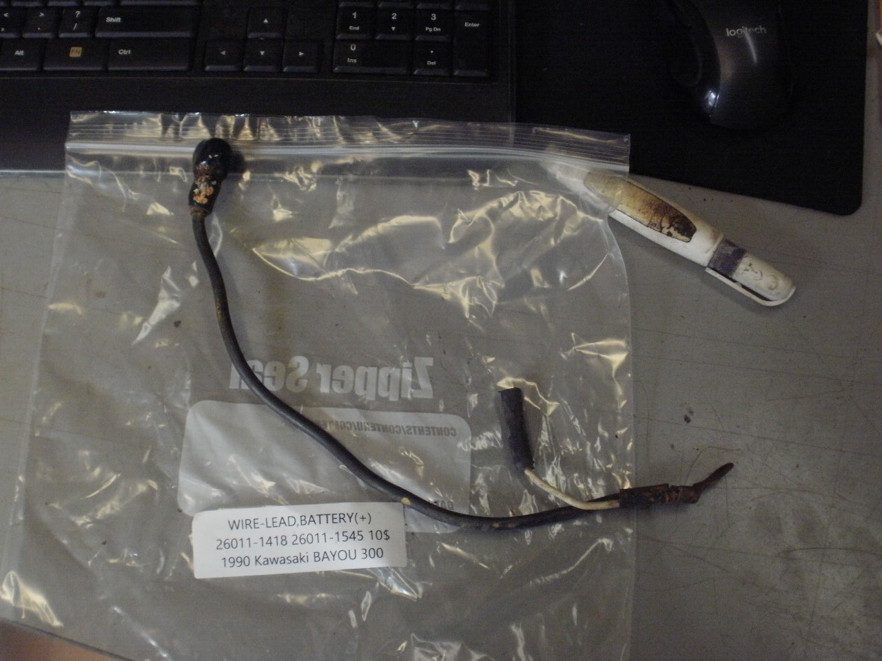 1990 KAWASAKI BAYOU 300 WIRE LEAD BATTERY (+) 26011-1418 26011-1545
