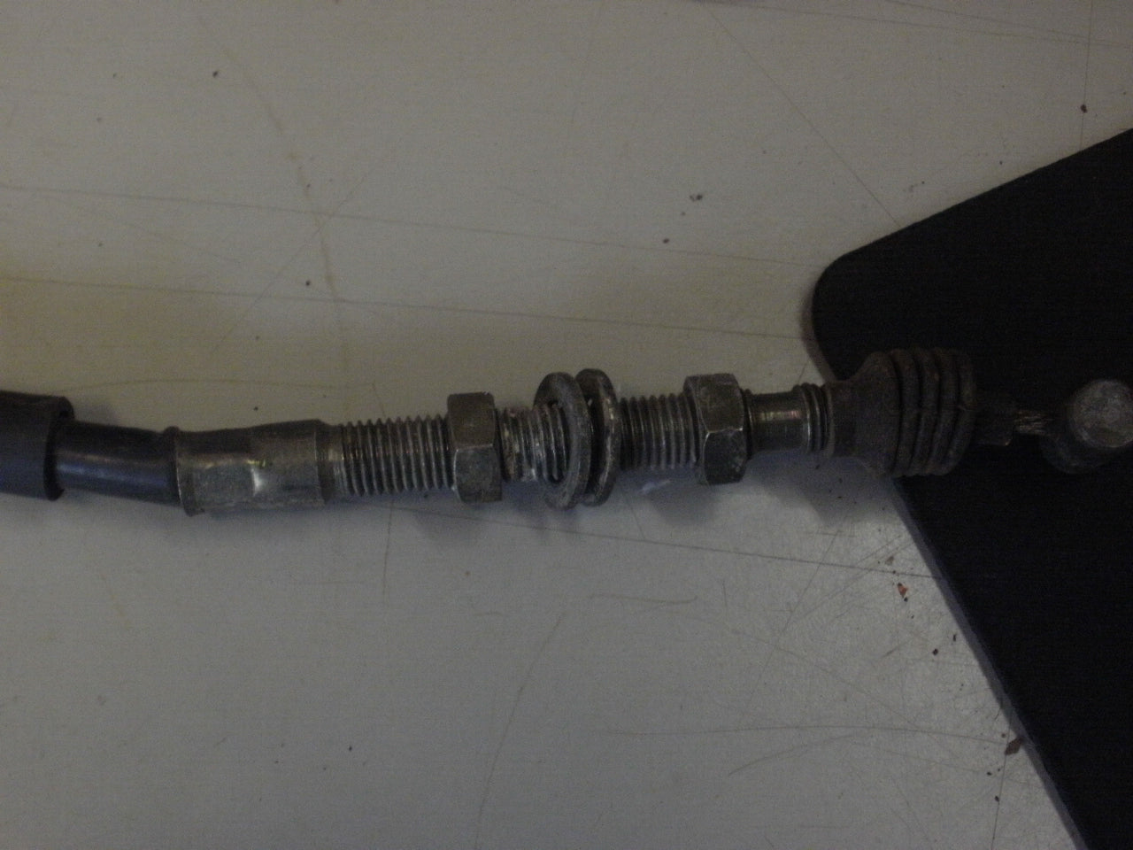 1994 KAWASAKI BAYOU 300 4X4 CABLE BRAKE FOOT 54005-1147