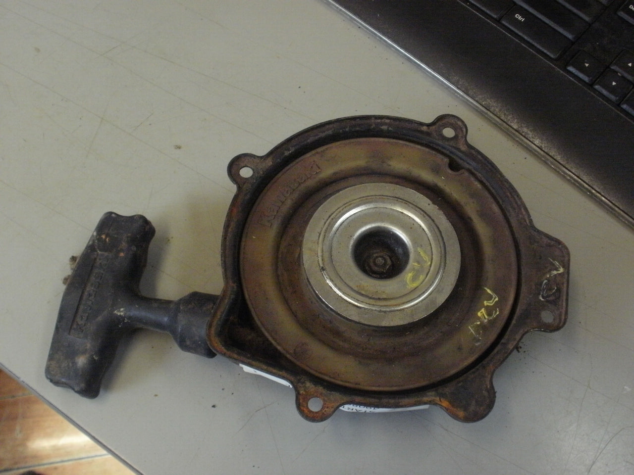 1990 KAWASAKI BAYOU 300 STARTER RECOIL 49088-1055